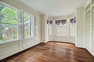 Study again with wall of built-in bookshelves pictured.