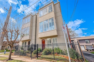 Modern three-story townhouse with expansive window