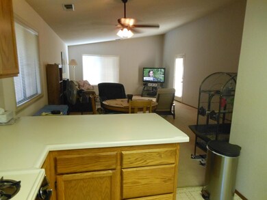 Kitchen looking into livingroom