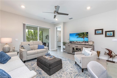 Living Room with slider doors out to the lanai