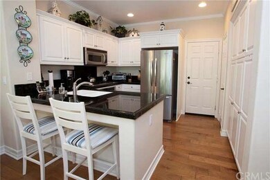 Kitchen with granite, stainless appliances, pantry