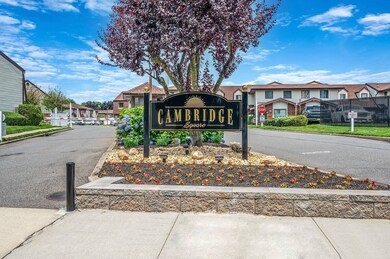 Community sign featuring a residential view