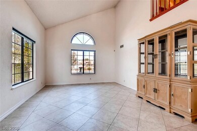 Impressive Living Room With Soaring Vaulted Ceilin