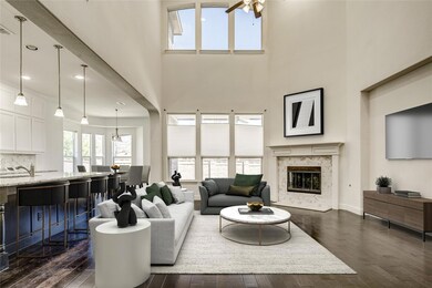 Living area featuring dark wood-style floors, base