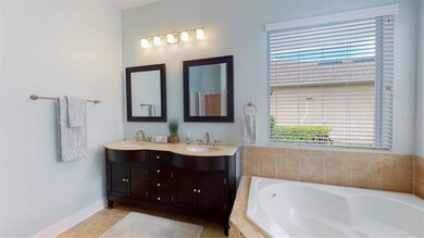 Master Bathroom with Dual sinks and garden tub