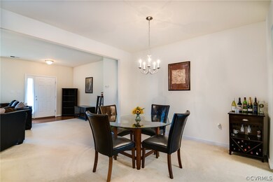 Dining area with updated lighting and neutral pain