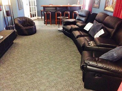 Living Room. USED AS THE THEATER ROOM