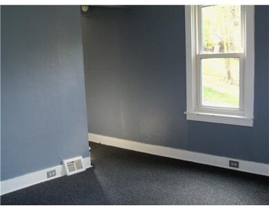 Living Room. Unit 1