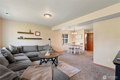 Open concept living to dining to kitchen on main level