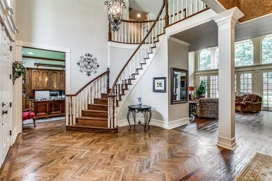 Foyer view with Curved staircase and stunning view of second floor and formal living room