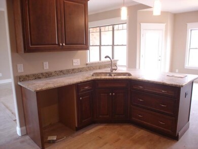 Open Kitchen with Granite Counter Tops