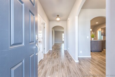 Entry, dining room on right
