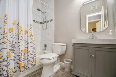 The bathroom has recently been beautifully updated