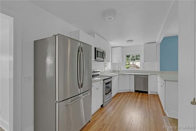Kitchen with appliances with stainless steel finis