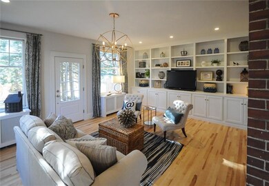 Large living room with custom built...