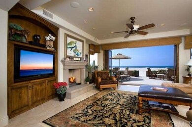 Living Room with Fireplace opens to Beachside Pati