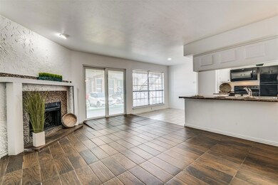 Large living room open to the dining and kitchen a