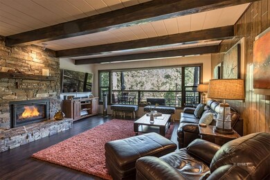 Living room with ledgestone fireplace