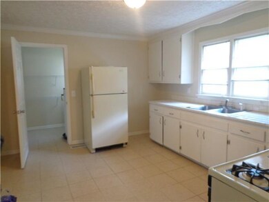 Kitchen offers tile flooring & a 9'x6' Pantry w/ Door