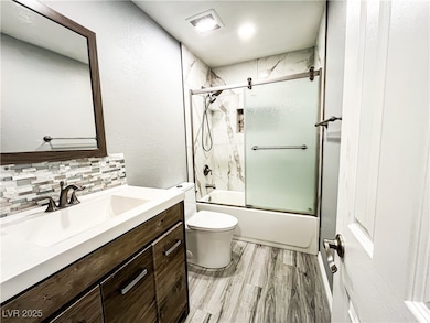 Bathroom featuring visible vents, bath / shower co