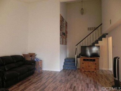Bright spacious living room.  High vaulted ceiling