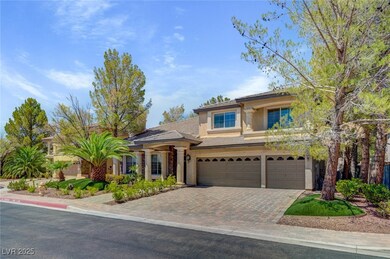 View of front of property with driveway, stucco si