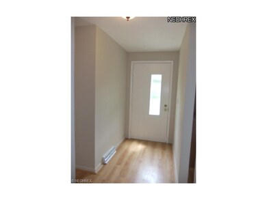 The foyer welcomes you into this home and starts t