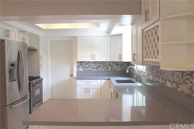 Brand new stainless steel appliances and a farmers