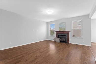 Spacious great room. Awesome plank flooring!
