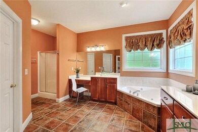 Clay tones and gorgeous tiling create a pleasing a