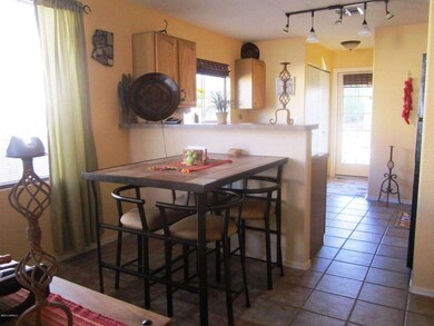 eating area & bar into kitchen