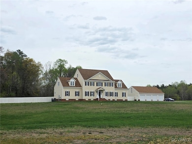 View of front of home featuring a front lawn and a