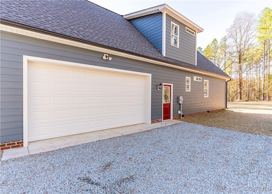 View of front of home featuring brick siding, a po
