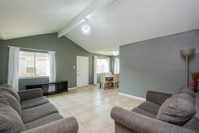 Spacious living area with abundant natural light.