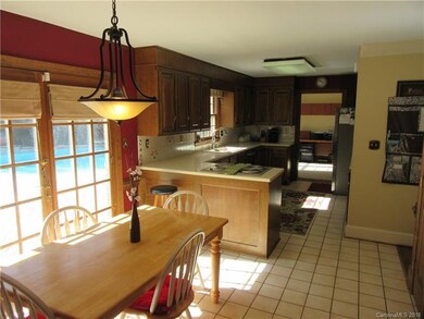 Eating area and kitchen with french doors to deck 