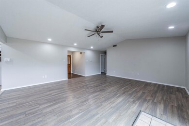 Unfurnished room featuring ceiling fan, lofted cei