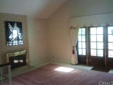 STEP DOWN LIVING ROOM WITH FRENCH DOOR OPEN TO SIDE YARD