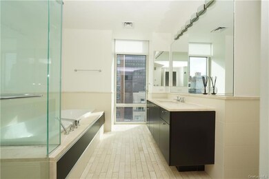 Bathroom featuring vanity and a bathing tub