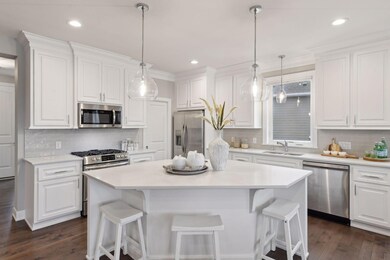 The Kitchen offers a large island and walk-in pantry. It is sure to become a favorite gathering place for family and friends.