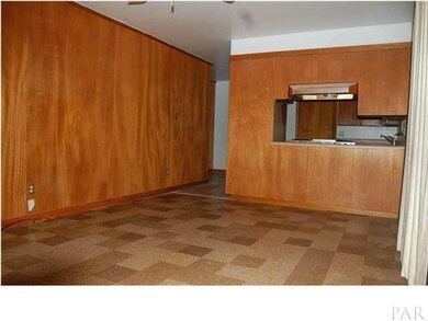 DEn with wood paneling & Period Tile