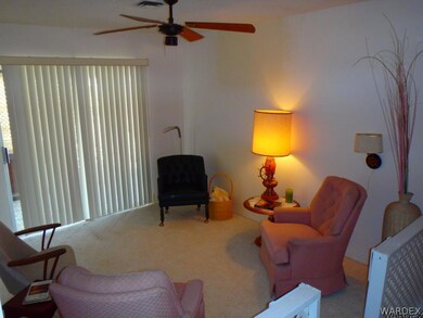 Den with closet  Slider outsi