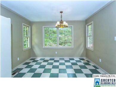 Large eating area with lots of windows and views o