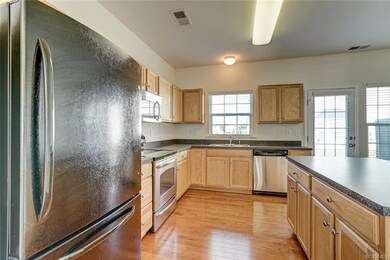 Kitchen with hardwood floors and an island!