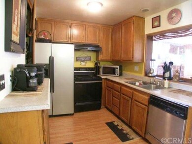 Upgraded cabinets, laminate flooring, new sink fix