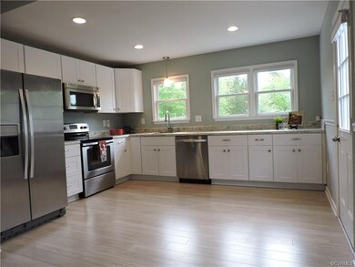 Kitchen stainless appliances included.