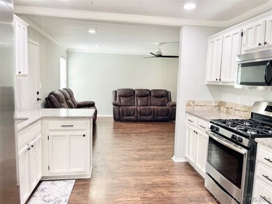 Kitchen looking into Family Room