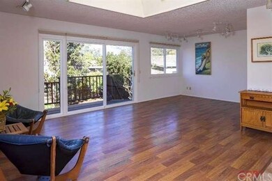 The house is flooded with natural light from skyli