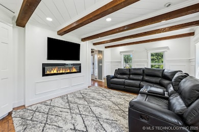 Just off the entry, the living room welcomes you w