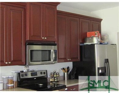 Kitchen. Raised cabinets with Stainless appliances