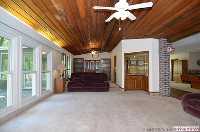 The family room is open to formal living and forma